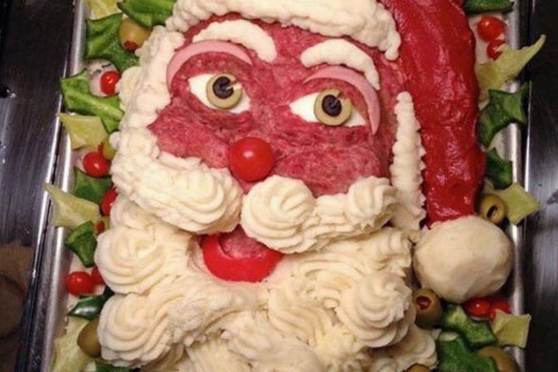 beef and mashed potato dish arranged to look like Santa Claus