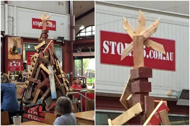 Christmas tree in store made from bricks and wood pallets