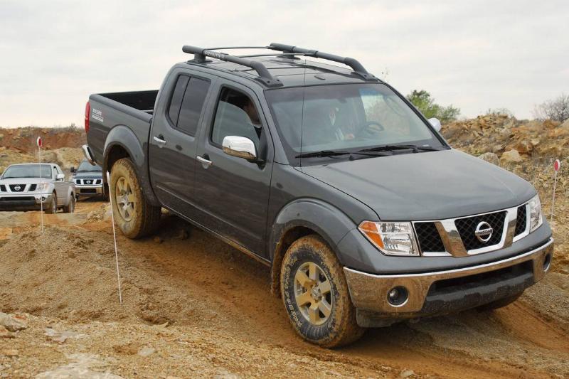 A Nissan Motor Co. Frontier pickup truck is pictured driving