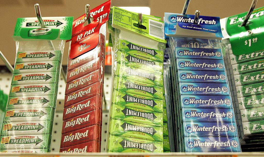 Packages of Wrigley's-brand chewing gum are displayed in a grocery store