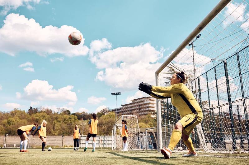 soccer-goalie-catching-the-ball-while-having-sport-2022-09-28-22-07-15-utc
