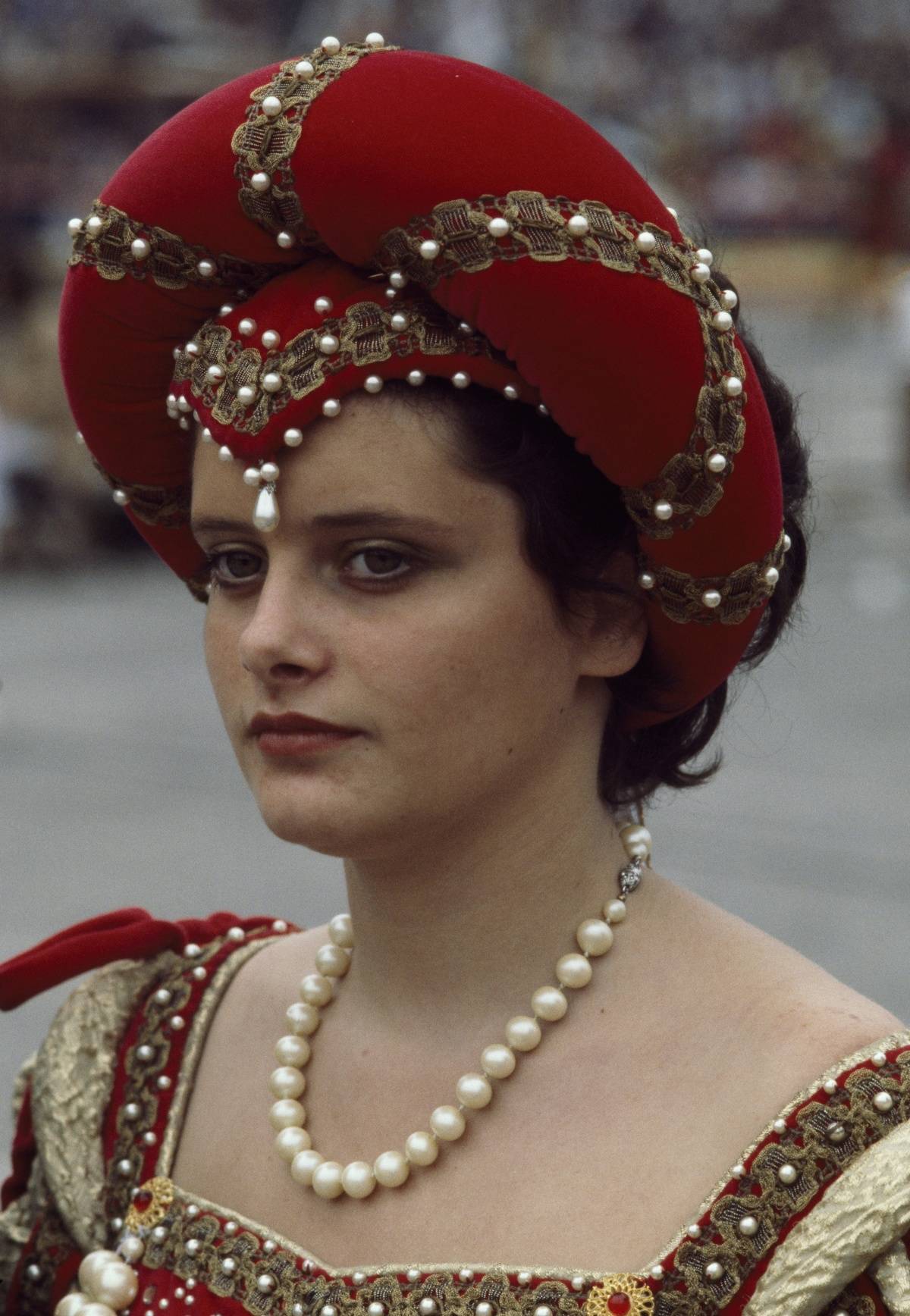 Woman wearing a period costume, Palio di Asti (festival), Piedmont, Italy.