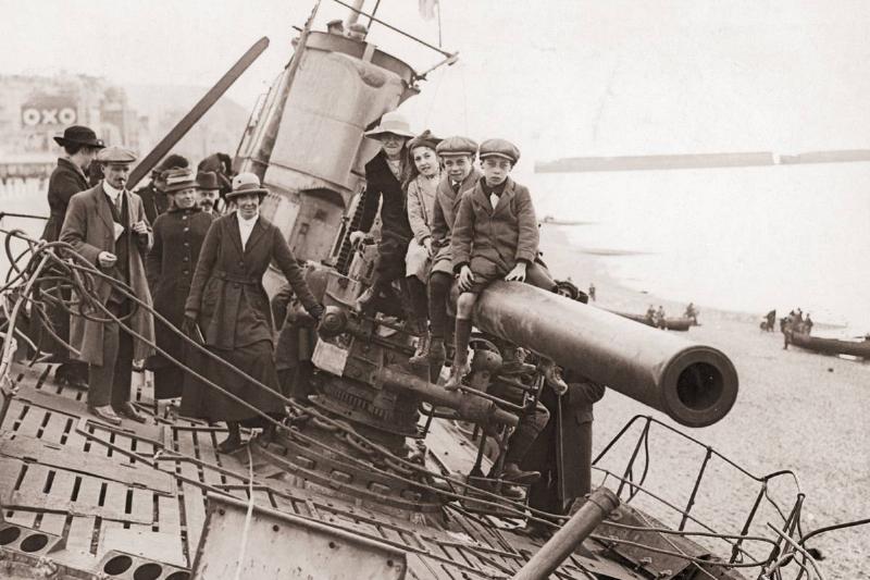 German U-Boat U-118 attracts the attention of locals after washing up on the beach at Hastings, 1919.