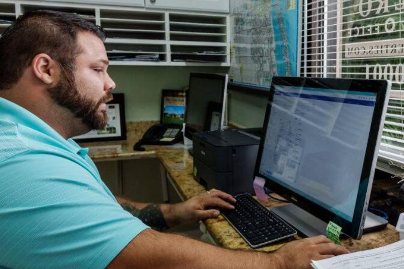 A real estate agent broker in his office A real estate agent broker in his office