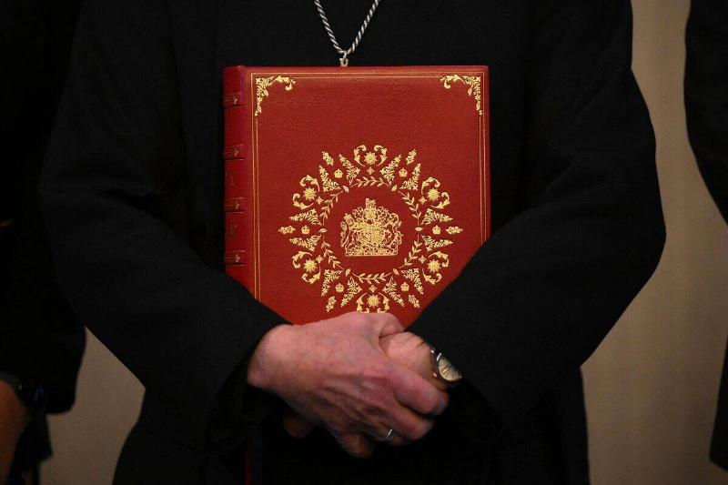 The Archbishop of Canterbury Justin Welby poses with the Coronation  Bible, a specially commissioned Bible which will be used during the 
Coronation Service when The King takes the Coronation Oath, in Lambeth 
Palace in London on April 20, 2023.