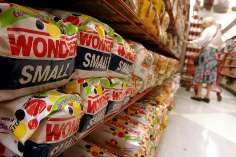Wonder Bread loaves are seen on the shelves of a grocery sto
