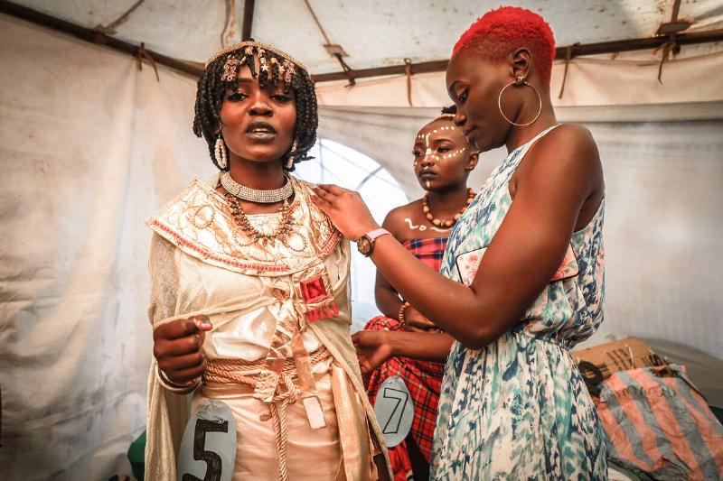 Modeling Fashion Contest in the Kibera Slums