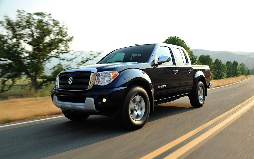 2012-Suzuki-Equator-front-three-quarter-in-motion