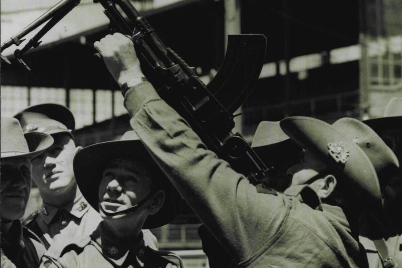 A digger using a Bren gun as an anti aircraft weapon.