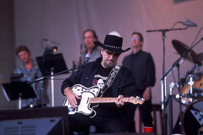 Waylon Jennings Performs Onstage