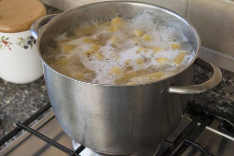 Pasta boiling in a large metal pot