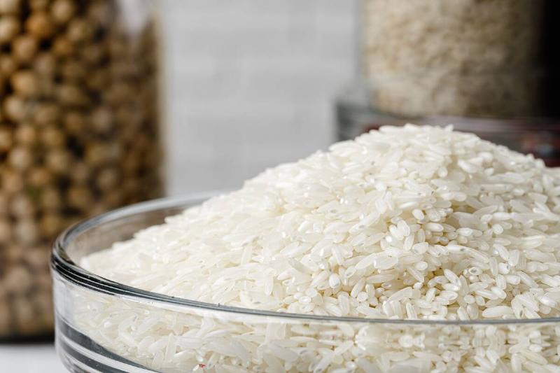 Uncooked white rice in a glass bowl