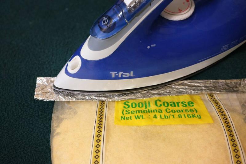 AI rendering of an iron being used to reseal a bag of semolina with aluminum foil