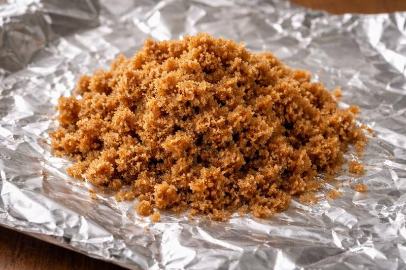 AI rendering of a pile of brown sugar placed on aluminum foil