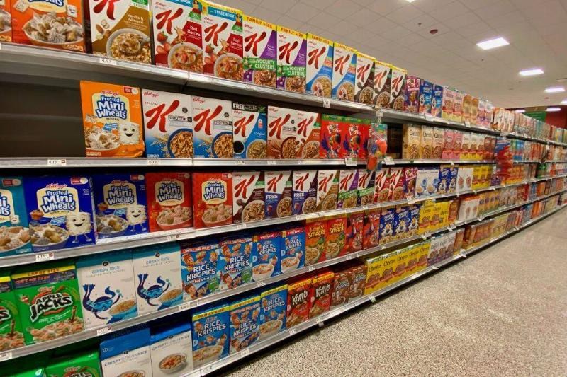 Boxes of cereal on grocery store shelves
