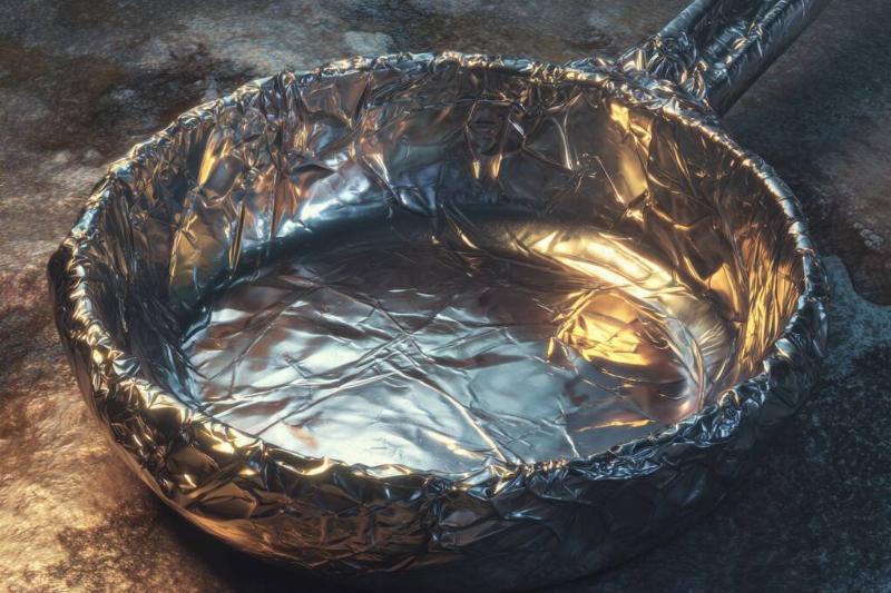 AI rendering of a frying pan, sat atop a kitchen counter, wrapped in aluminum foil