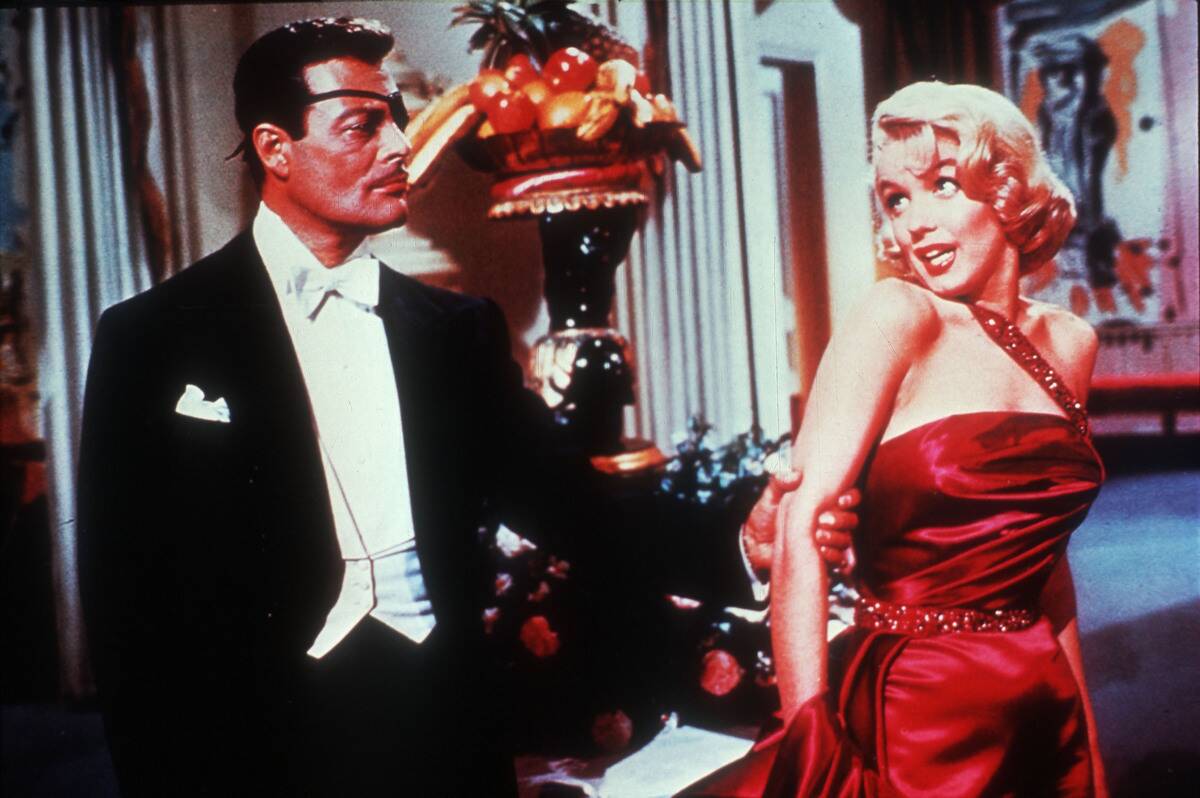 Alexander D'Arcy and Marilyn Monroe as J. Stewart Merrill and Pola Debevoise in 'How to Marry a Millionaire'