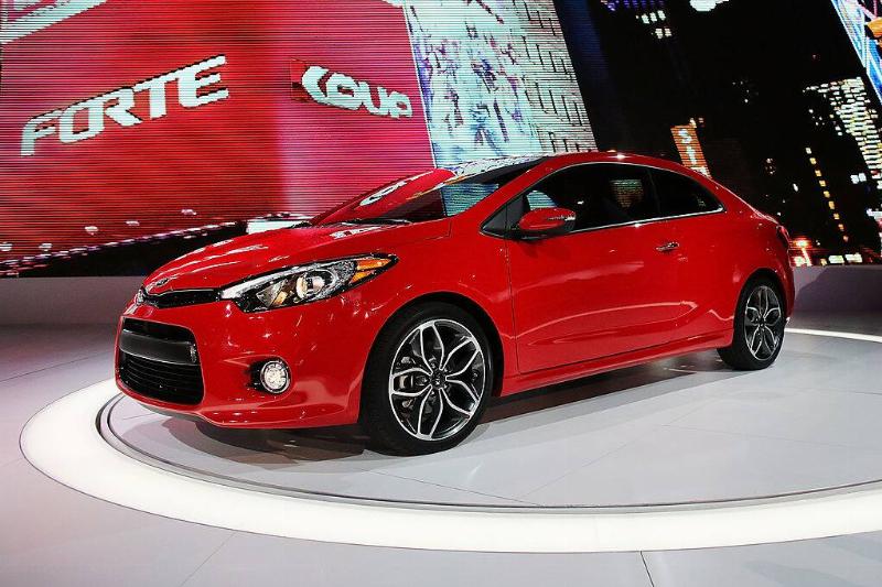 Red 2014 Kia Forte on display