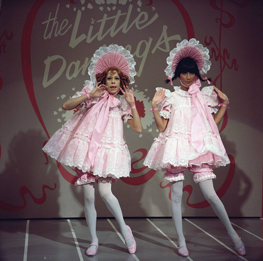 Carol Burnett and Cher dressed as babies on the set of 'The Sonny & Cher Comedy Hour'