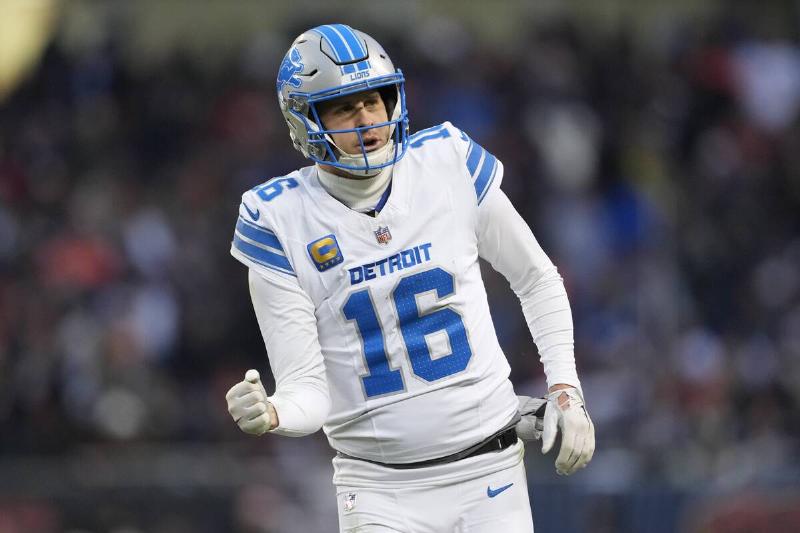 Jared Goff running in his football gear