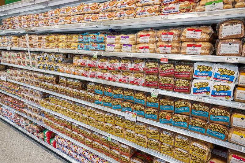 Rows of bread on grocery store shelves
