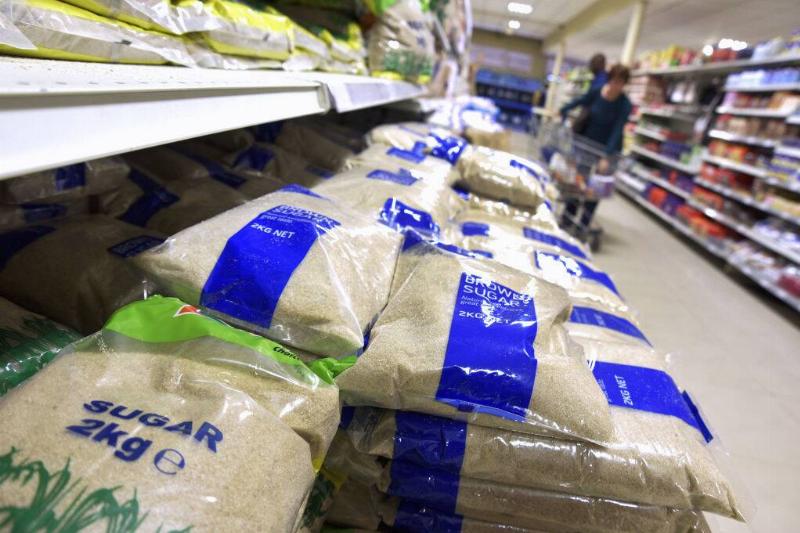 Bags of sugar in a grocery store