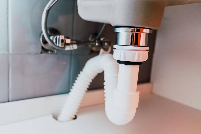 Piping beneath a sink