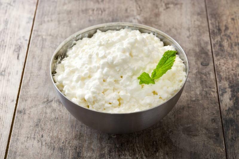 Cottage cheese in a metal bowl