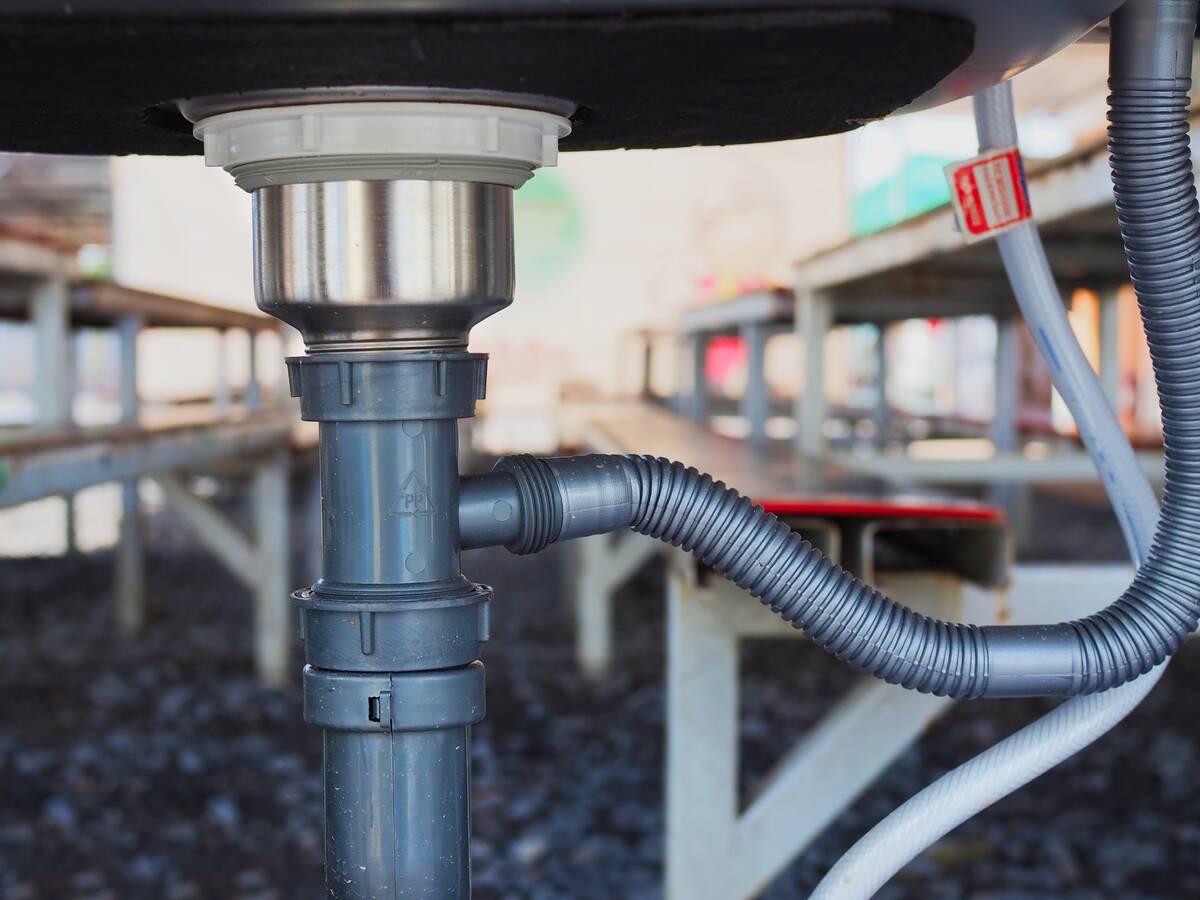 Piping beneath a sink