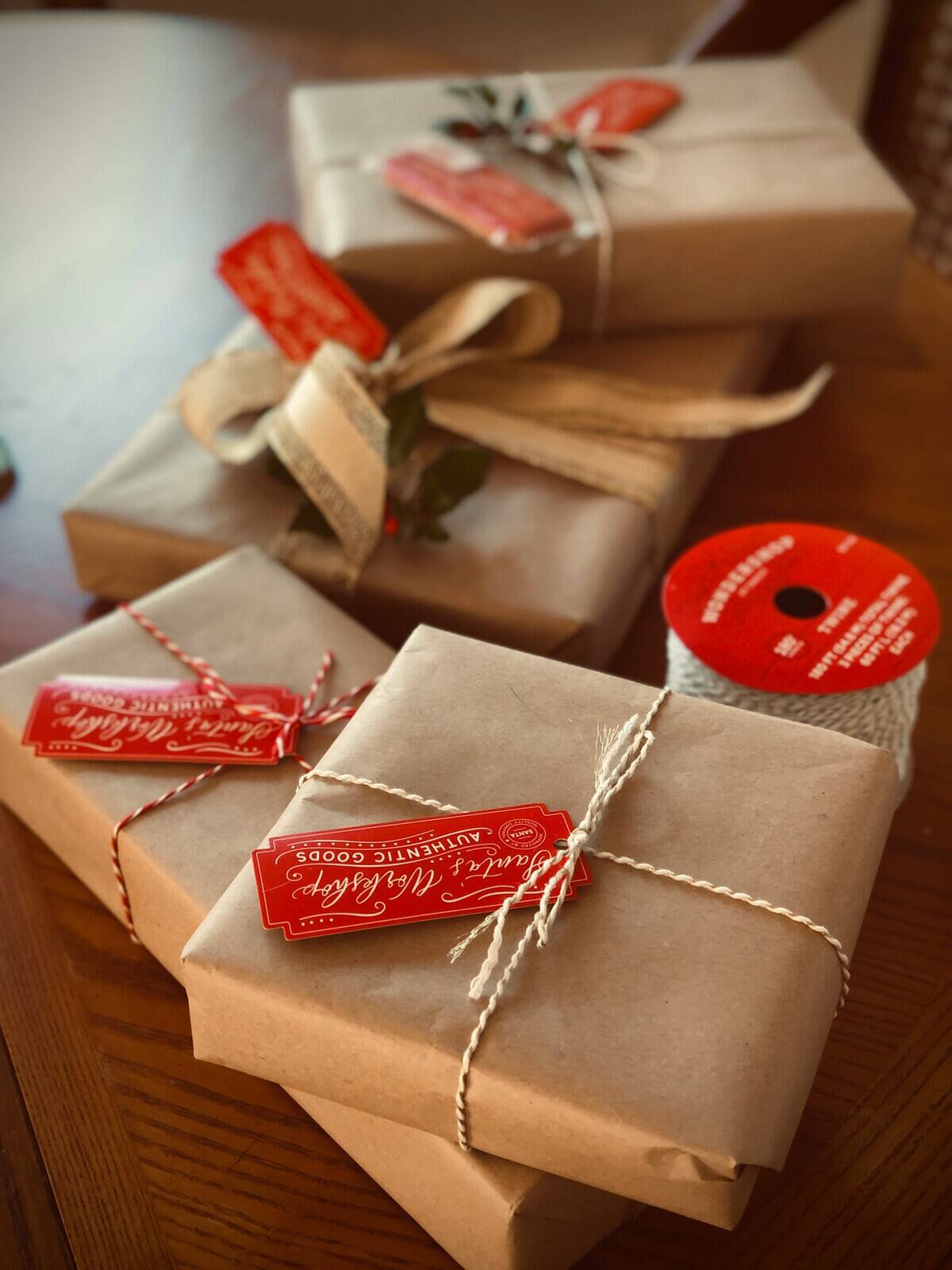 Packages wrapped in brown paper that's held shut with string