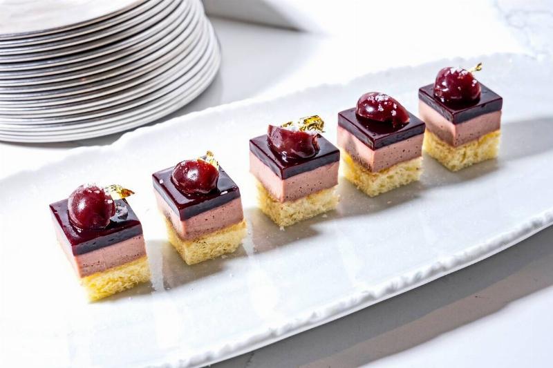 Five cubes of foie gras on a plate