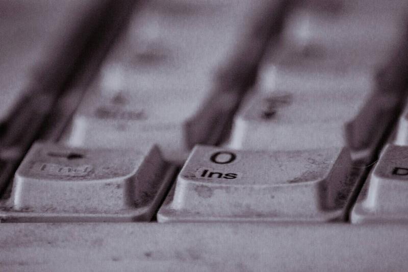 Close-up of keys on a dirty keyboard
