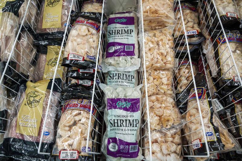 Frozen shrimp and seafood in a store freezer