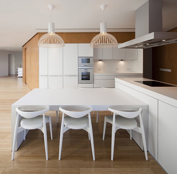 Mop House – minimalist kitchen with white furniture and island