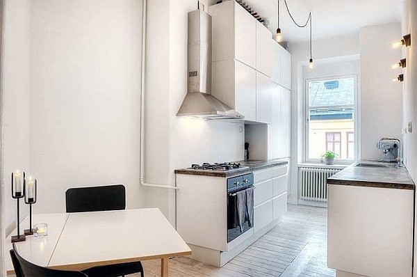 One Bedroom Apartment Stockholm 4 – white kitchen with medieval accents