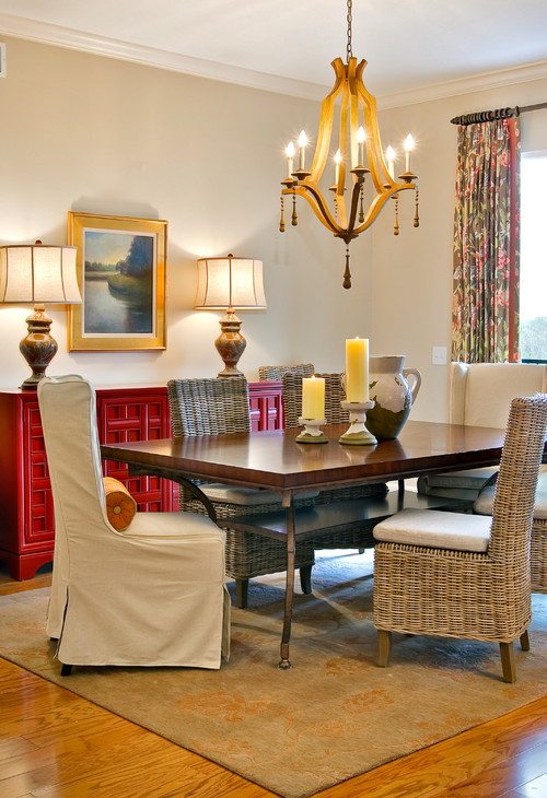 traditional dining room with red cabinets