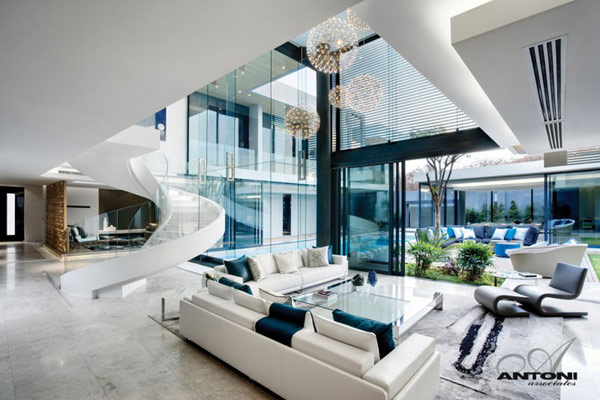 Opulent modern home in Houghton – living room design with fancy stairs