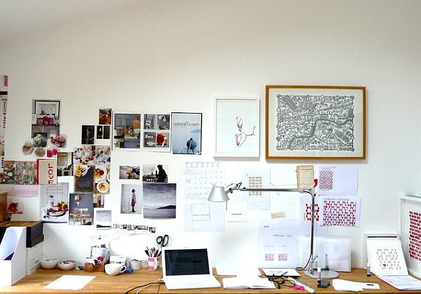Modern office with fancy collage on the walls