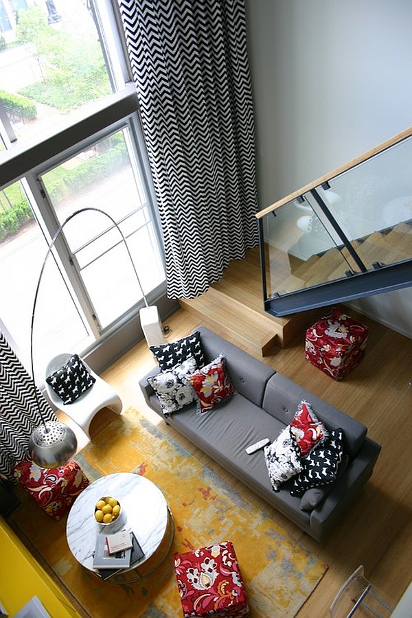 Long black and white curtains in a loft apartment loft apartment with long black and white curtains