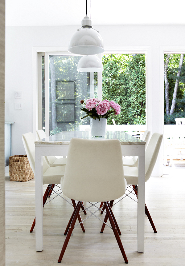 White dining room with purple flowers