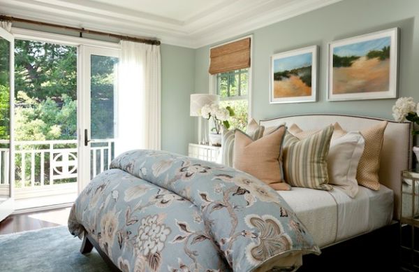 Serene and stylish bedroom in relaxing hues with woven wood shades