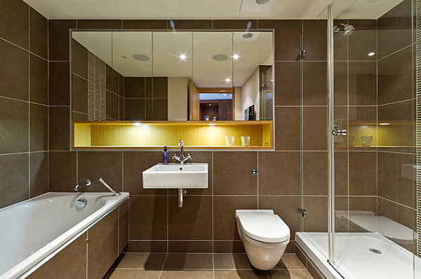 Brown bathroom with blue and gold details