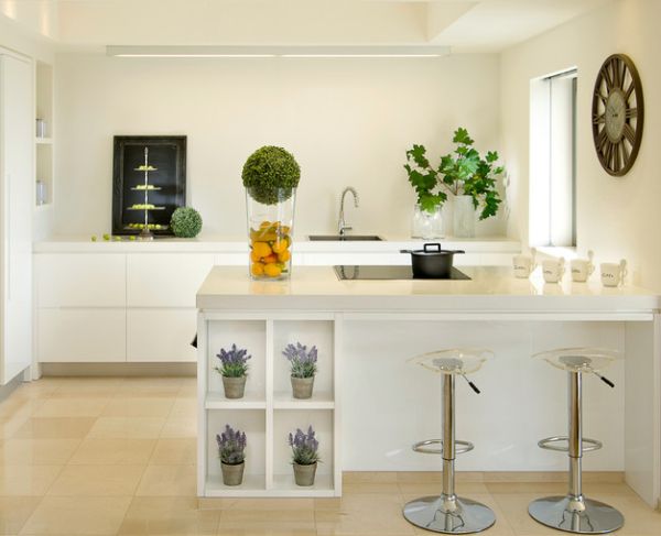 Displaying a wall clock above the kitchen counter seems to be a popular choice in modern homes
