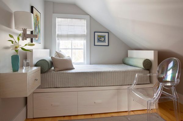 Storage underneath the bed and decor that does away with legs – Perfect for small bedrooms