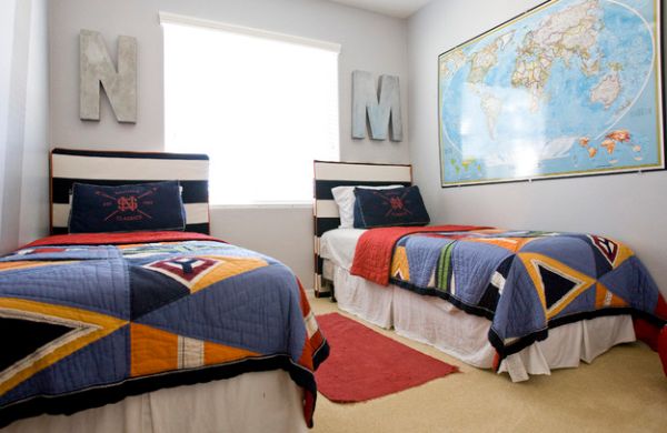 Boys’ bedroom with twin beds and a nautical theme