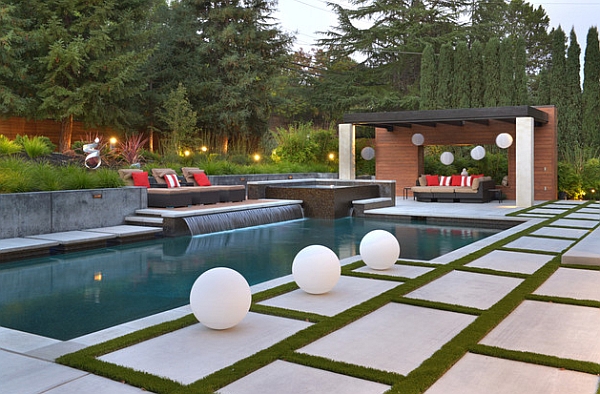 A perfect pool waterfall idea for those who love sleek minimalism