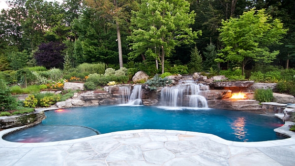 Swimming pool waterfalls that flow naturally out
