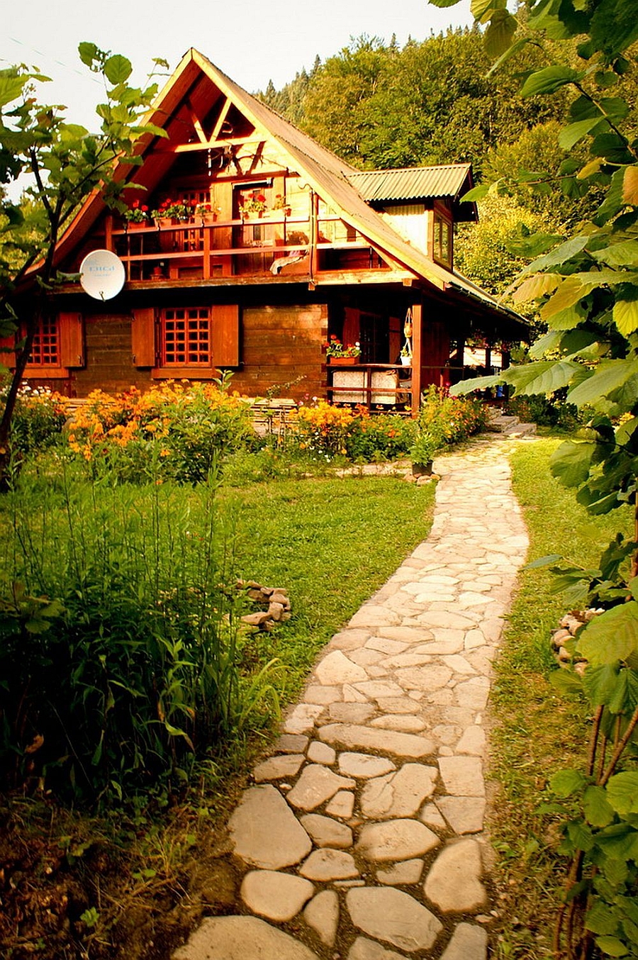 Stone pathway that leads to the lovely rustic Romanian House