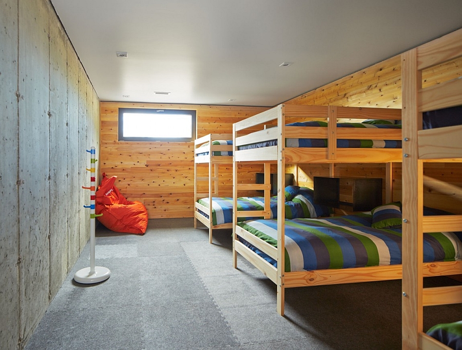 Kids’ room with bink beds and a rustic cabin look