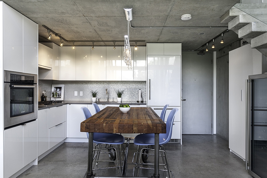 Sleek modern kitchen in white with glossy cabinets